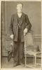 Unknown - Portrait of young man posing with an umbrella